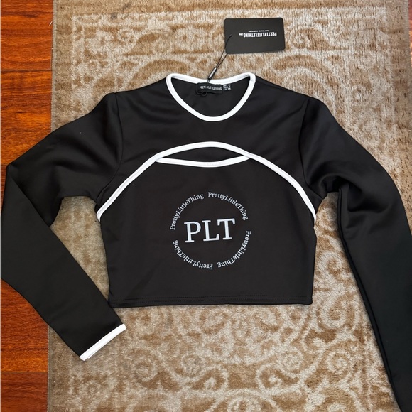 PrettyLittleThing Tops - PLT monogram crop top long sleeve active wear cut out pretty little thing